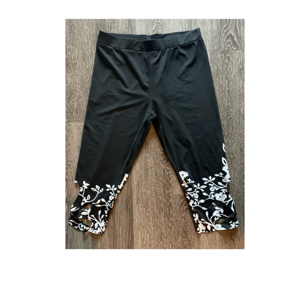 WORN ONCE! SUPER CUTE CAPRI PANTS WITH FLORAL HEM AND HOLE ACCENTS! - Picture 9 of 9